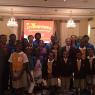 Mr. Huang Qinguo, Chinese Embassador and Mr. Henfield, Minister of Foreign Affairs of the Government of the Bahamas had a photo with the students and teacher of CI at UB who gave performace at the reception